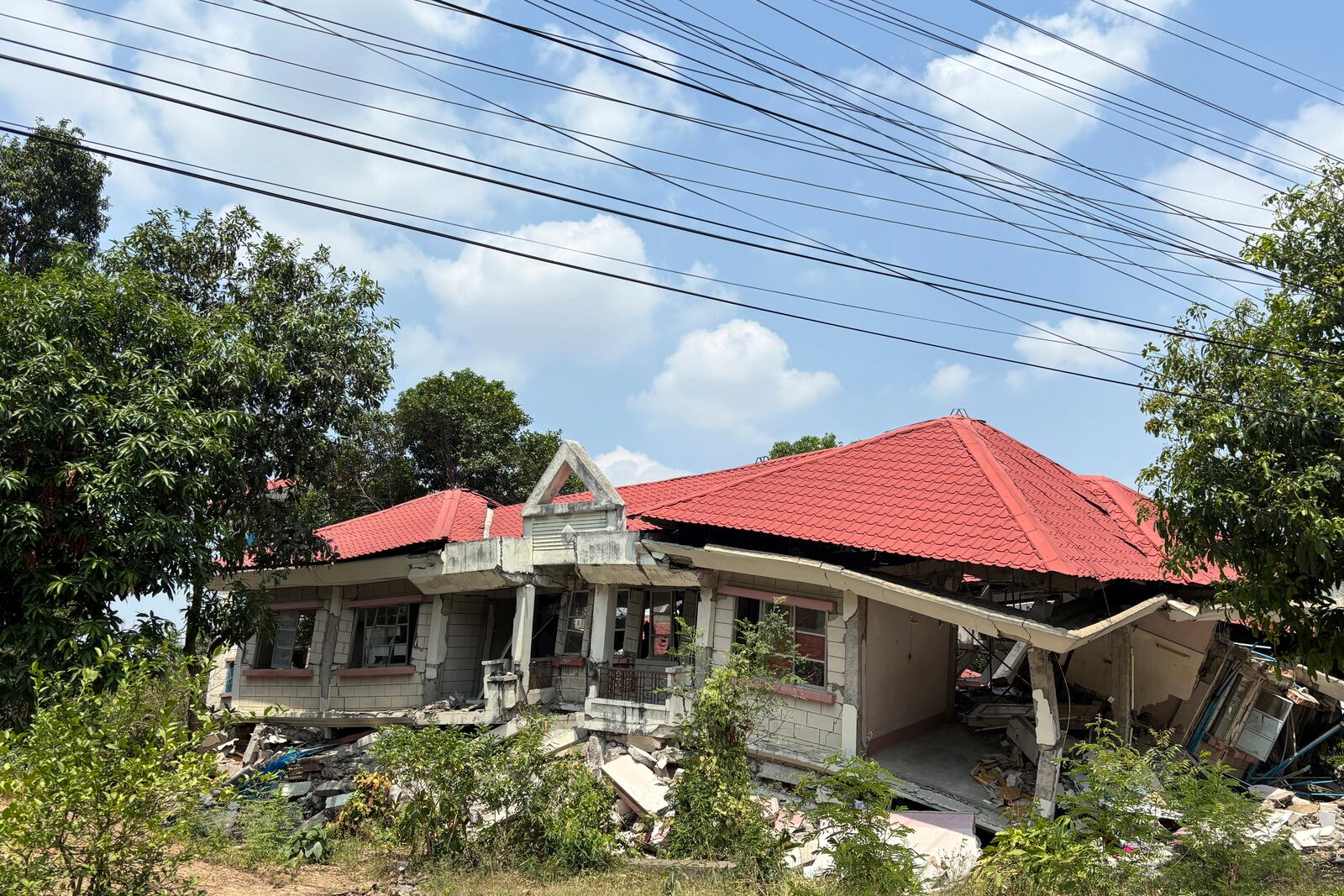 A damaged building is seen in Naypyitaw, Myanmar, Monday, April 28, 2025, one month after the earthquake. (AP Photo/Aung Shine Oo)