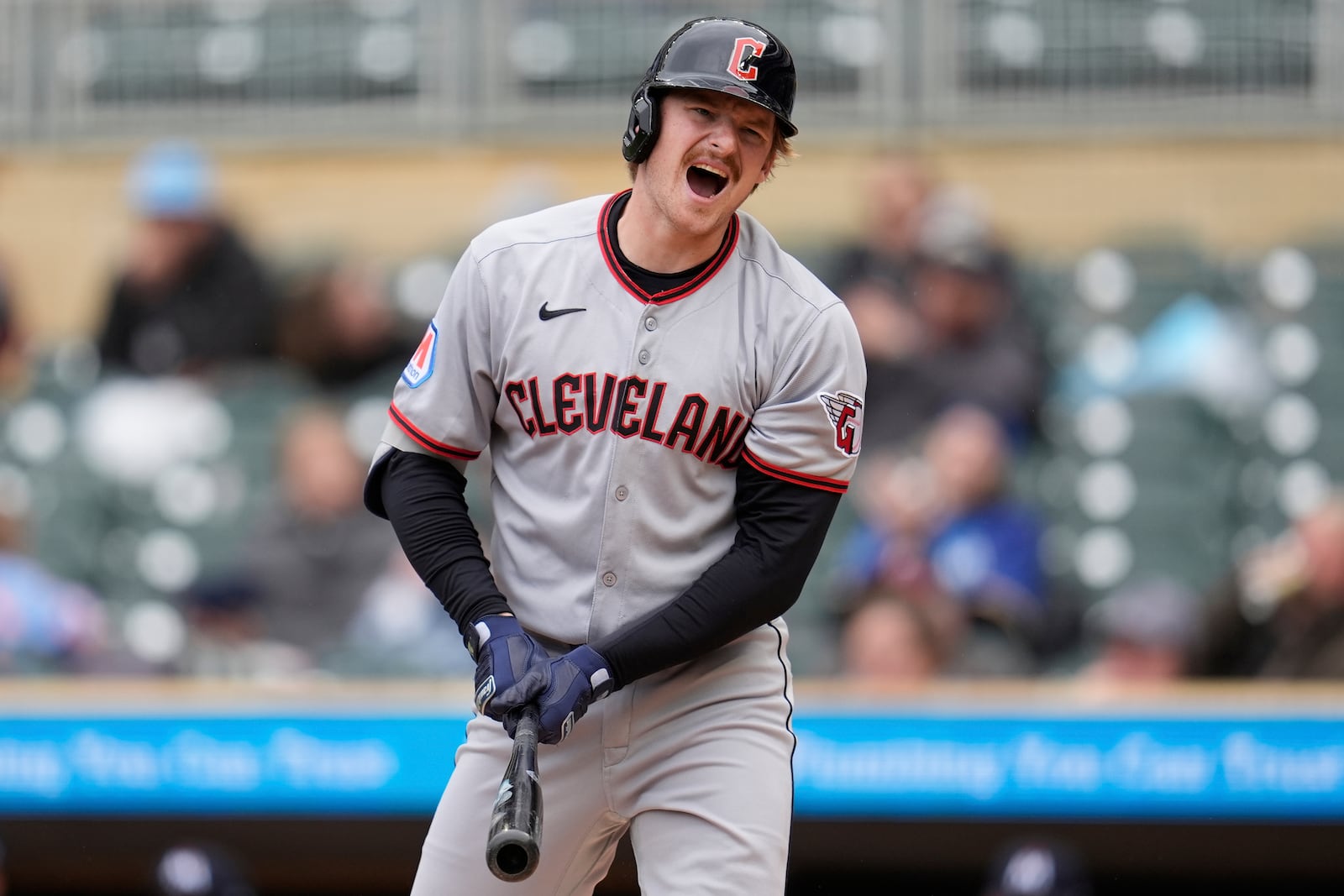 Cleveland Guardians' Kyle Manzardo (9) reacts after striking out to end the top of the first inning in the second baseball game of a doubleheader against the Minnesota Twins, Wednesday, May 21, 2025, in Minneapolis. (AP Photo/Abbie Parr)