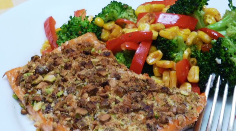 Pistachio Salmon with Pan Roasted Ginger, Corn and Broccoli. (Linda Gassenheimer/TNS)