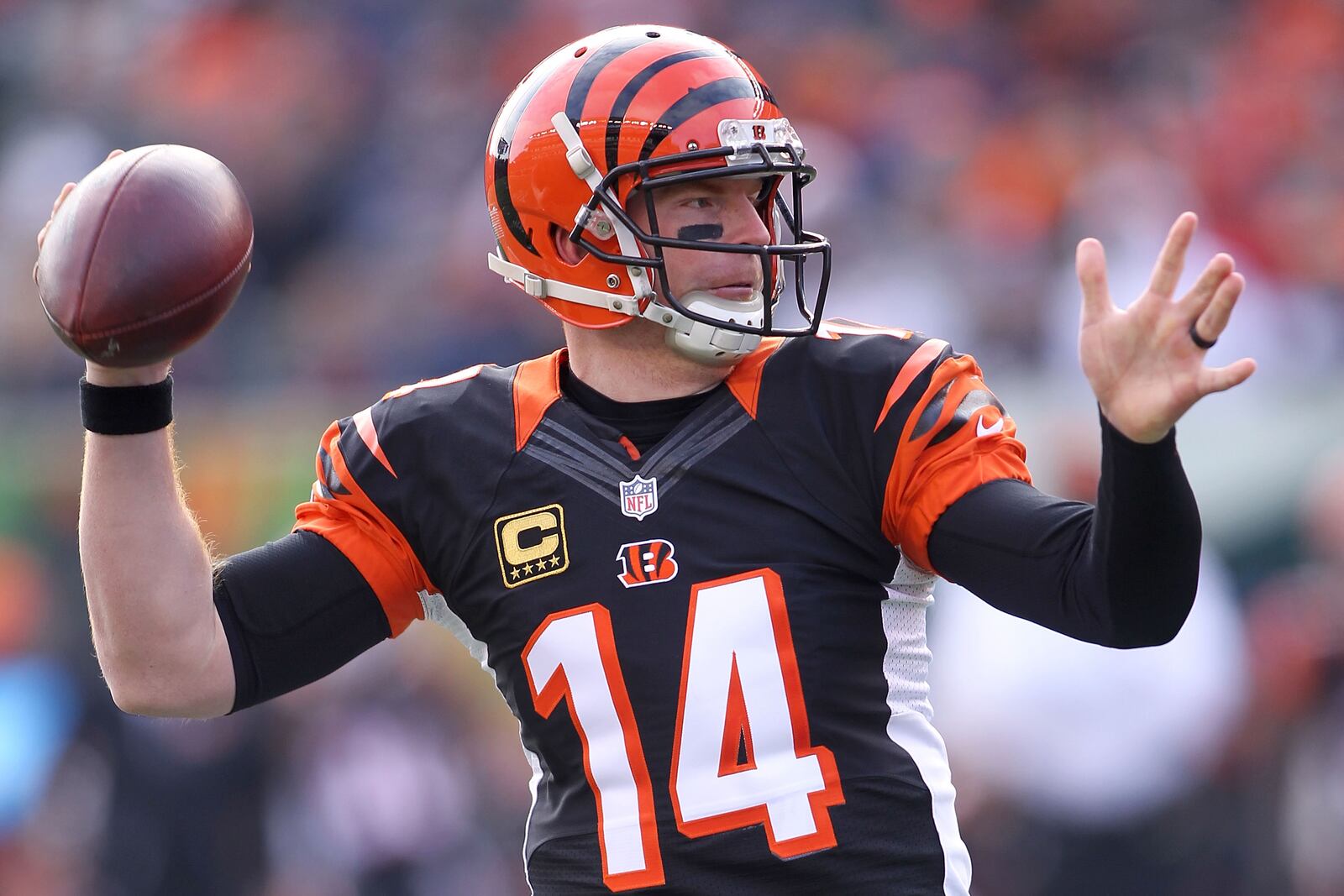  CINCINNATI, OH - JANUARY 1: Andy Dalton #14 of the Cincinnati Bengals throws a pass during the first quarter of the game against the Baltimore Ravens at Paul Brown Stadium on January 1, 2017 in Cincinnati, Ohio. (Photo by John Grieshop/Getty Images)