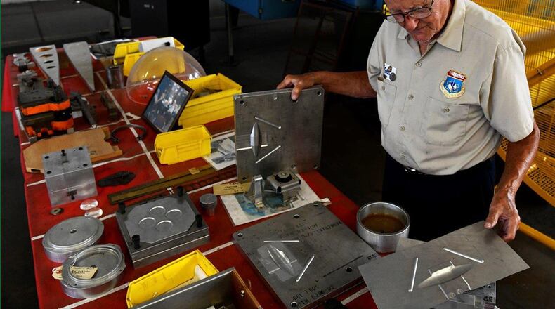 John Rumpf, a restoration volunteer at the National Museum of the United States Air Force, works to restore pieces of aircraft to be exhibited. (U.S. Air Force photo/Darrius A. Parker)