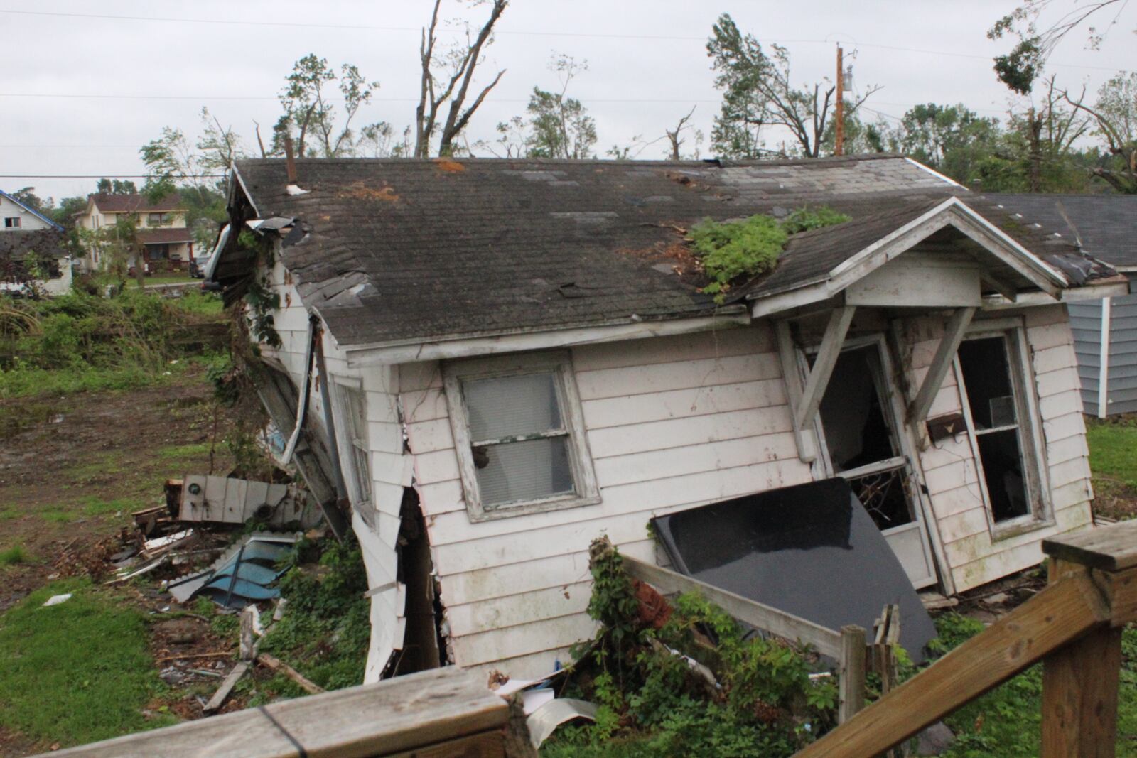 Robin and  Chris Sassenberg  house and cottage was damaged during the Memorial Day tornadoes.  The tornado change the landscape and property around the house. This cottage behind the family's home is pictured.