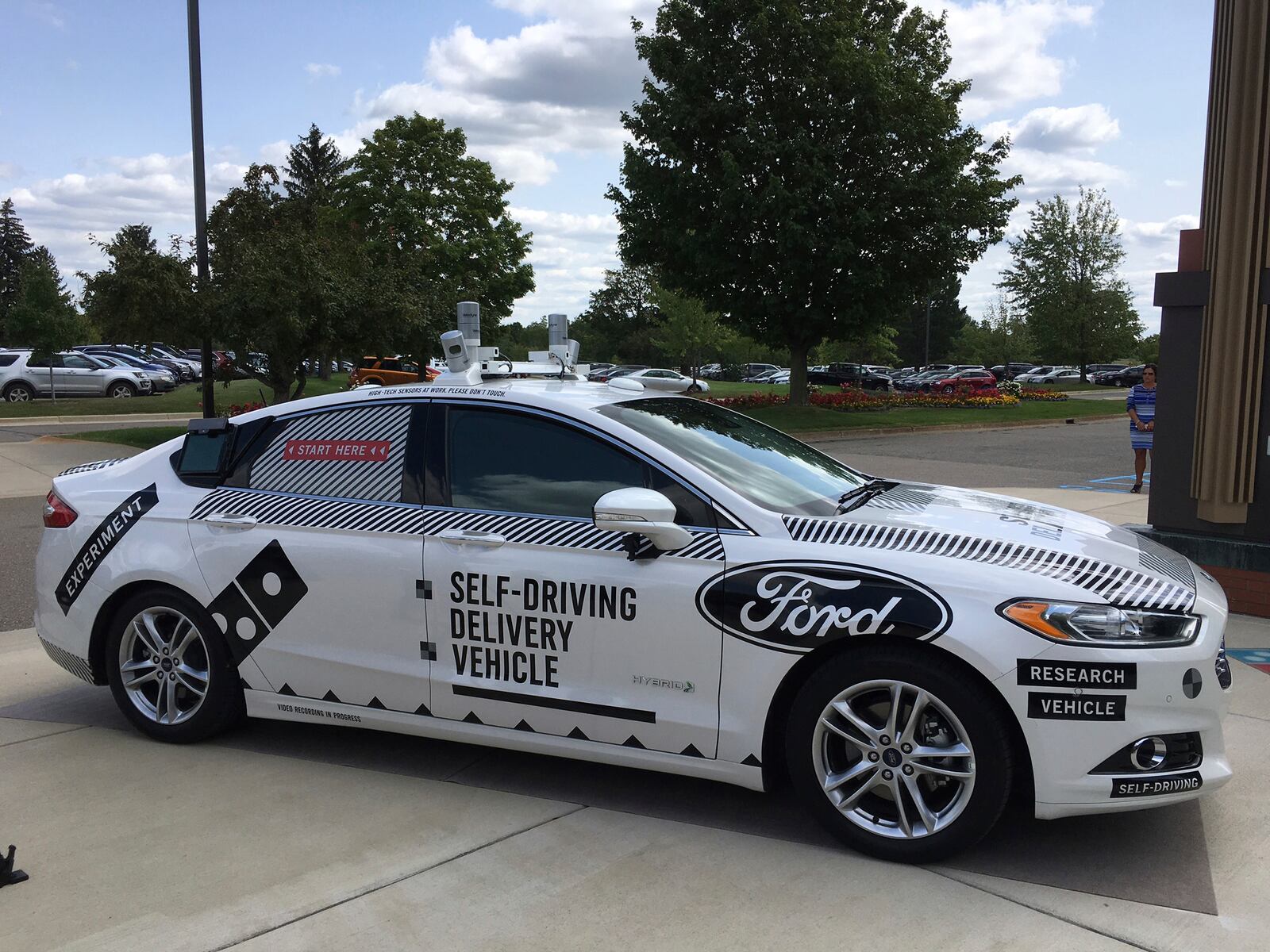 Here’s the specially designed delivery car that Ford Motor Co. and Dominos Pizza will use to test self-driving pizza deliveries in Michigan. (AP Photo/Dee-Ann Durbin)