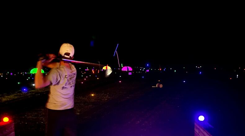 Taking aim at fun at Bellbrook Glow Golf - contributed