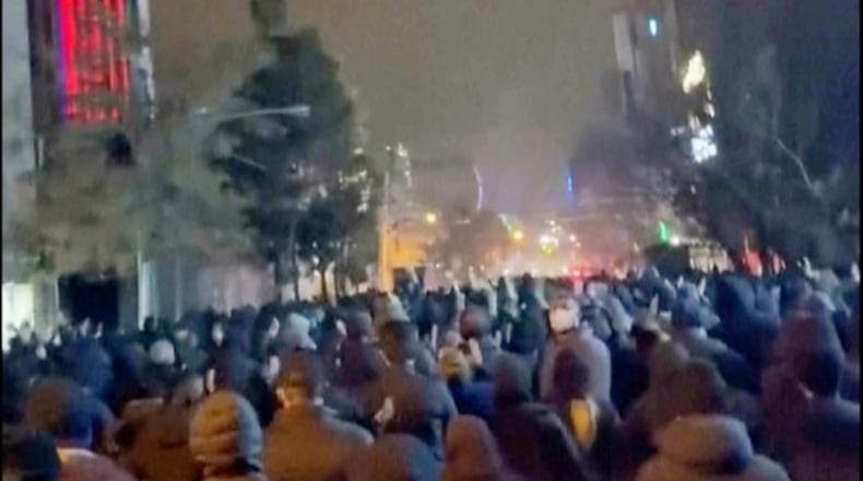 In this frame grab from footage circulating on social media from Iran showed protesters once again taking to the streets of Tehran despite an intensifying crackdown as the Islamic Republic remains cut off from the rest of the world in Tehran, Iran, Saturday Jan. 10, 2026. (UGC via AP)
