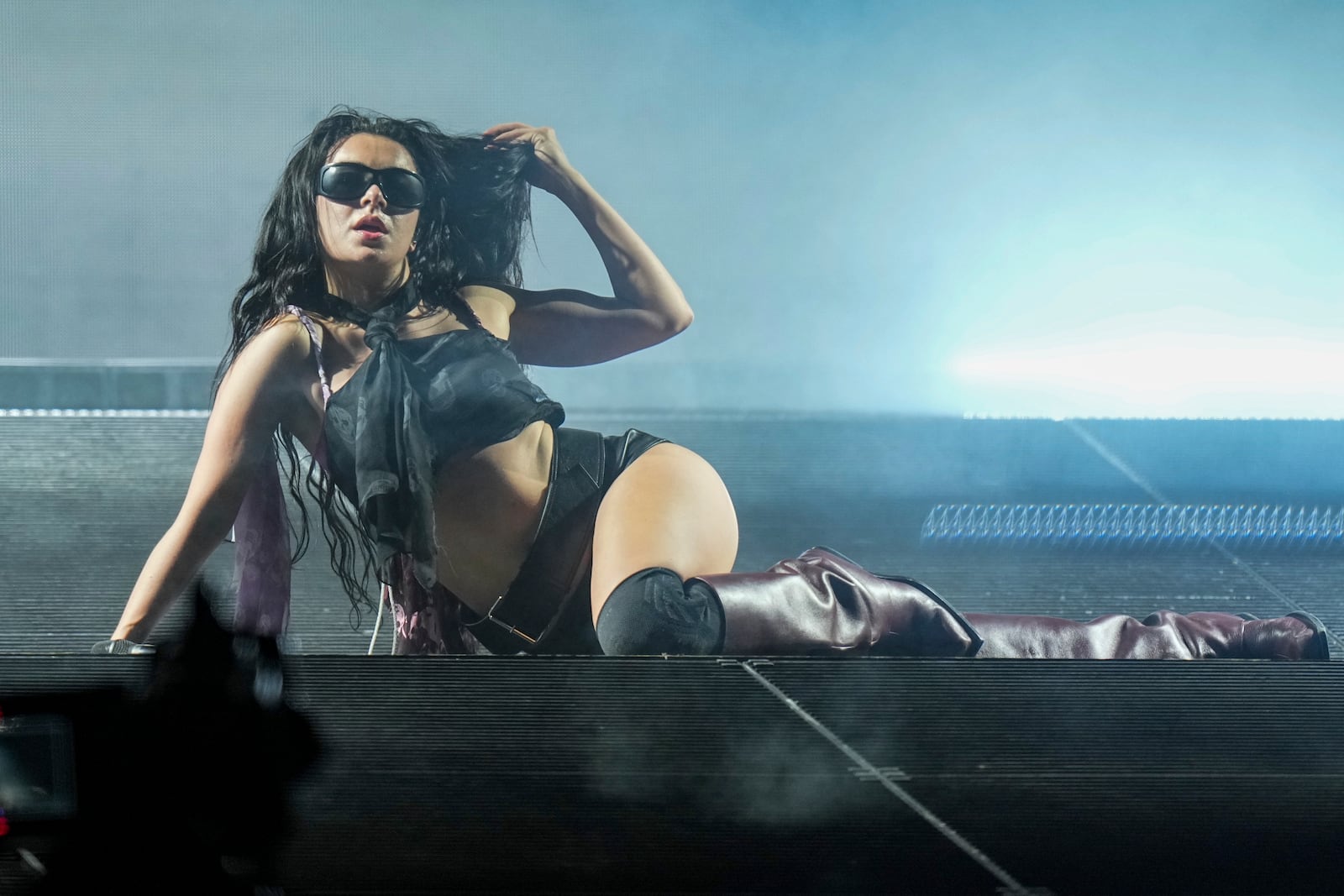 Charli xcx performs during the Glastonbury Festival in Worthy Farm, Somerset, England, Saturday, June 28, 2025. (Scott A Garfitt/Invision/AP)