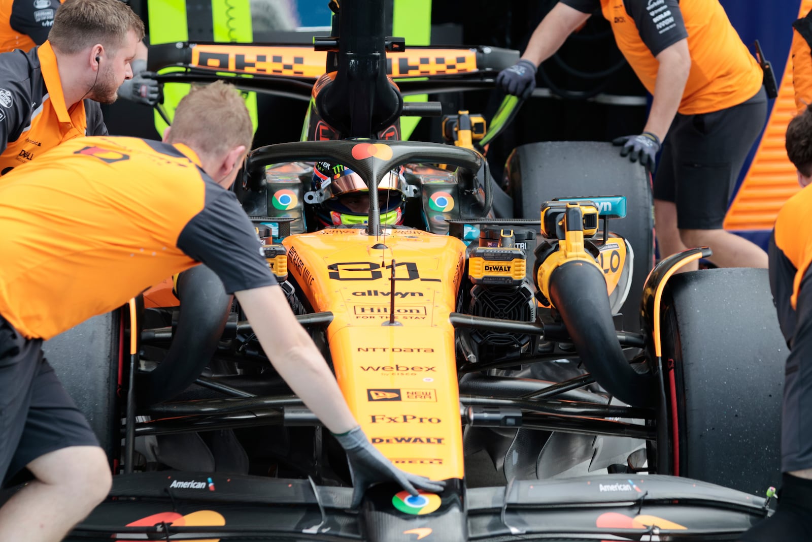 McLaren driver Oscar Piastri of Australia is wheeled in to the garage during the qualifying session for the Formula One Miami Grand Prix auto race at the International Autodrome, Saturday, May 3, 2025, in Miami Gardens, Fla. (Shawn Thew/Pool Photo via AP)