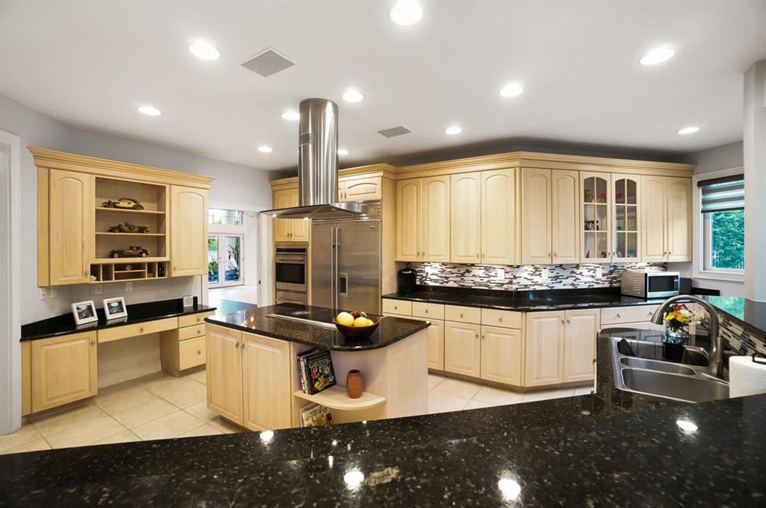 Photos: $1M luxury home listed has waterfall, swimming pool and kitchen to die for
