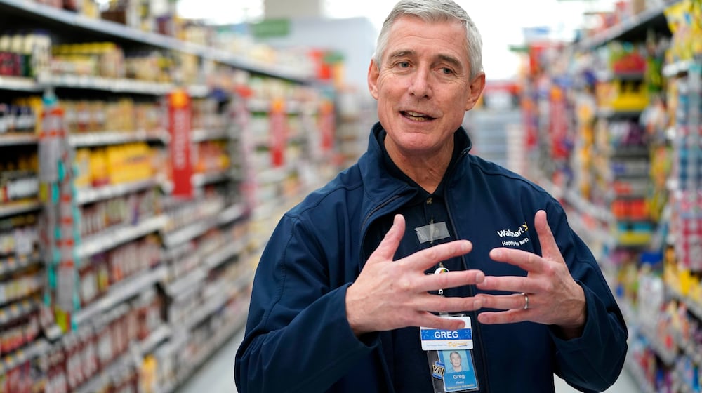 FILE - In this Nov. 9, 2018, file photo, Walmart U.S. President and CEO Greg Foran speaks during an interview at a Walmart Supercenter in Houston. (AP Photo/David J. Phillip, File)