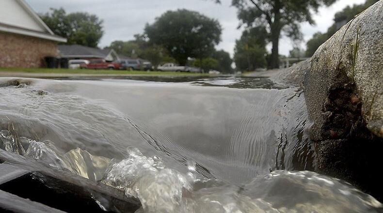 As stewards of the environment, people should ensure the only thing that enters a storm drain is surface runoff from stormwater. No wastewater, oil, hazardous waste, common household chemicals, etc. should enter storm water drains. (Kim Brent/The Beaumont Enterprise via AP)