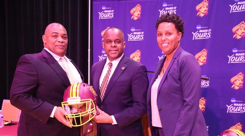 (left to right): New Central State football coach Kevin Porter, who played in the NFL for the Kansas City Chiefs and New York Jets; CSU president Dr. Jack Thomas and CSU athletics director Tara Owens (Photo by Nick Novy/CSU)