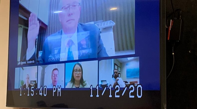 Wright State Applied Research Director Dennis Andersh is sworn in via Zoom for a hearing in Greene County Common Pleas court on releasing his emails requested by the Dayton Daily News.