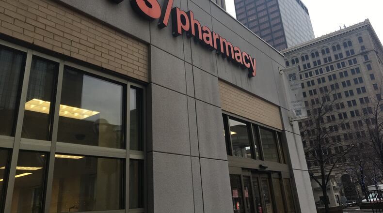 The CVS Pharmacy in downtown Dayton. Dayton water customers can pay their bills at CVS and Family Dollar stores. CORNELIUS FROLIK / STAFF