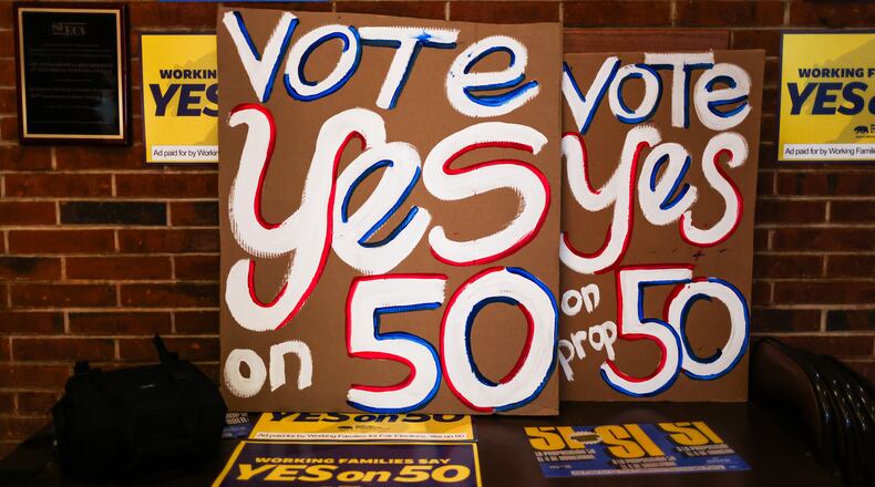 Posters at the IBEW Local 6 headquarters ahead of a campaign event in support of Proposition 50 in San Francisco, Monday, Nov. 3, 2025. (Gabrielle Lurie/San Francisco Chronicle via AP)