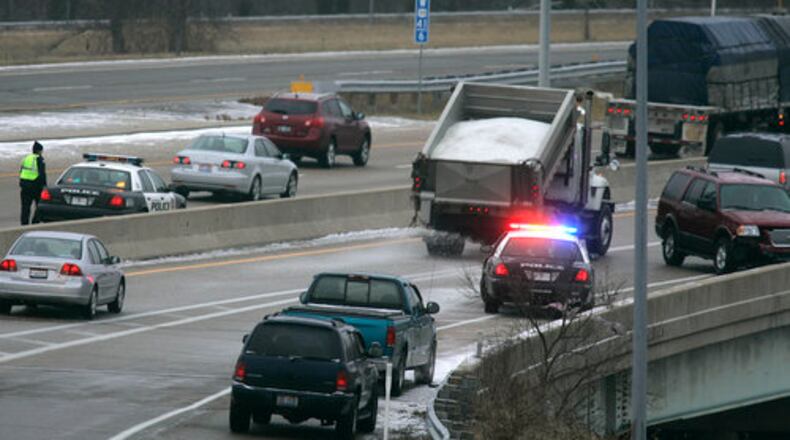Police and road crews respond to auto accidents at U.S. 35 and I-675 in Beavercreek. FILE PHOTO