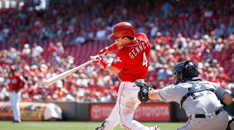 CINCINNATI, OH - AUGUST 10: Scooter Gennett #4 of the Cincinnati Reds hits a grand slam home run in the seventh inning of a game against the San Diego Padres at Great American Ball Park on August 10, 2017 in Cincinnati, Ohio. (Photo by Joe Robbins/Getty Images)