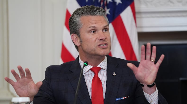 Defense Secretary Pete Hegseth speaks during a roundtable on criminal cartels with President Donald Trump in the State Dining Room of the White House, Thursday, Oct. 23, 2025, in Washington. (AP Photo/Evan Vucci)