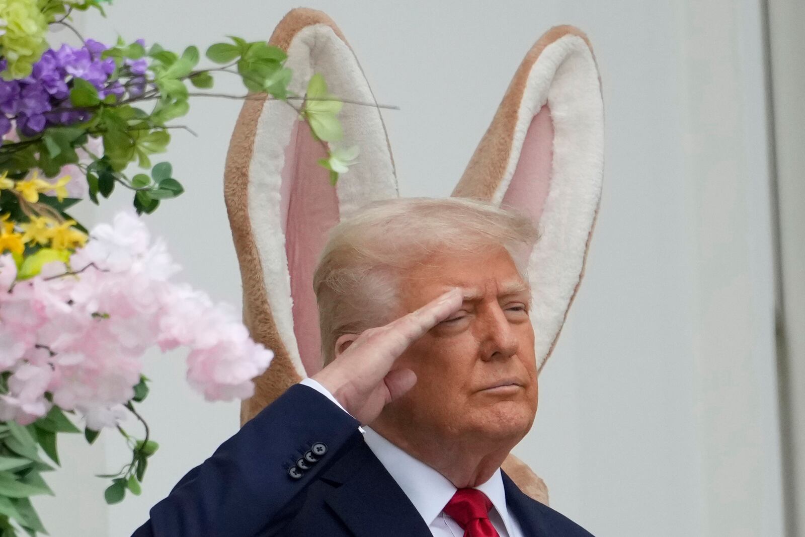 President Donald Trump arrives on the Blue Room Balcony to participate in the White House Easter Egg Roll Monday, April 21, 2025, in Washington. (AP Photo/Alex Brandon)