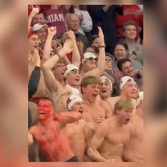 The Miami University's men's swim team is seen in the crowd at the March 18, 2026 First Four basketball team where Miami played SMU, and won. STAFF