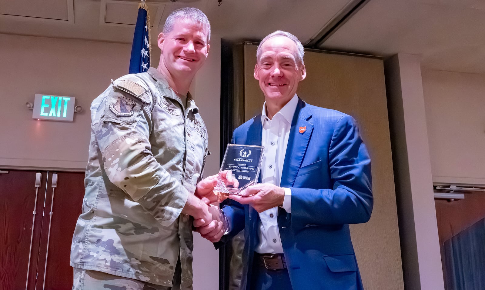 Col. Dustin Richards, commander of the 88th Air Base Wing at Wright-Patterson Air Force Base, recognizes Jeff Hoagland, president and CEO of the Dayton Development Coalition. The Association of Defense Communities has named Hoagland as a "local defense community champion." Contributed