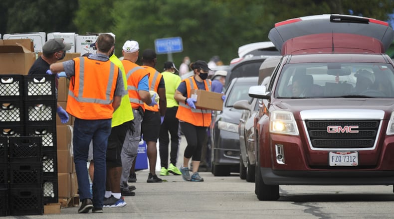 The Foodbank held it's mass food distribution Thursday, Aug. 27, 2020 at the University of Dayton Welcome Stadium.