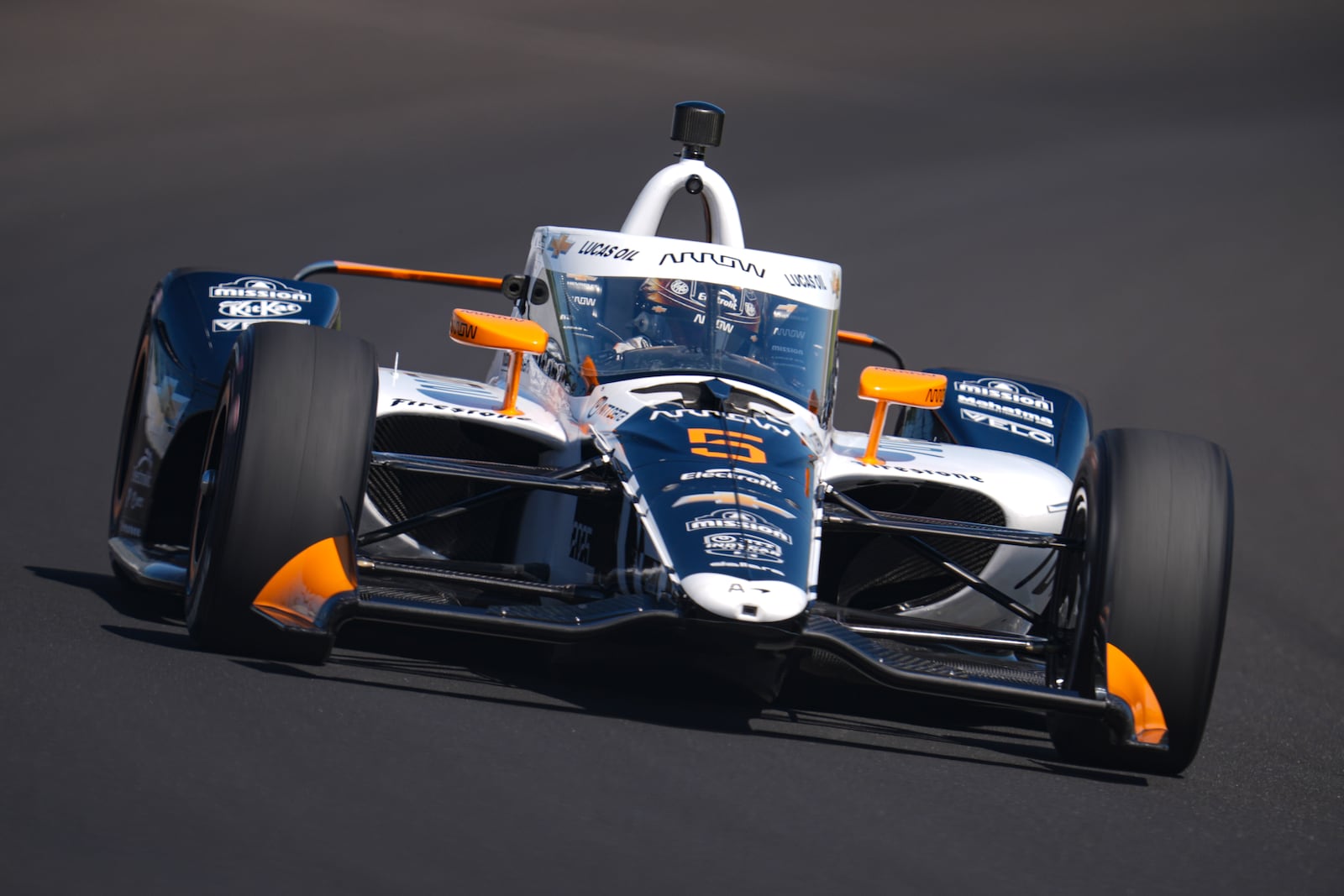 Pato O'Ward, of Mexico, drives through the third turn during qualifications for the Indianapolis 500 auto race at Indianapolis Motor Speedway in Indianapolis, Sunday, May 18, 2025. (AP Photo/Michael Conroy)