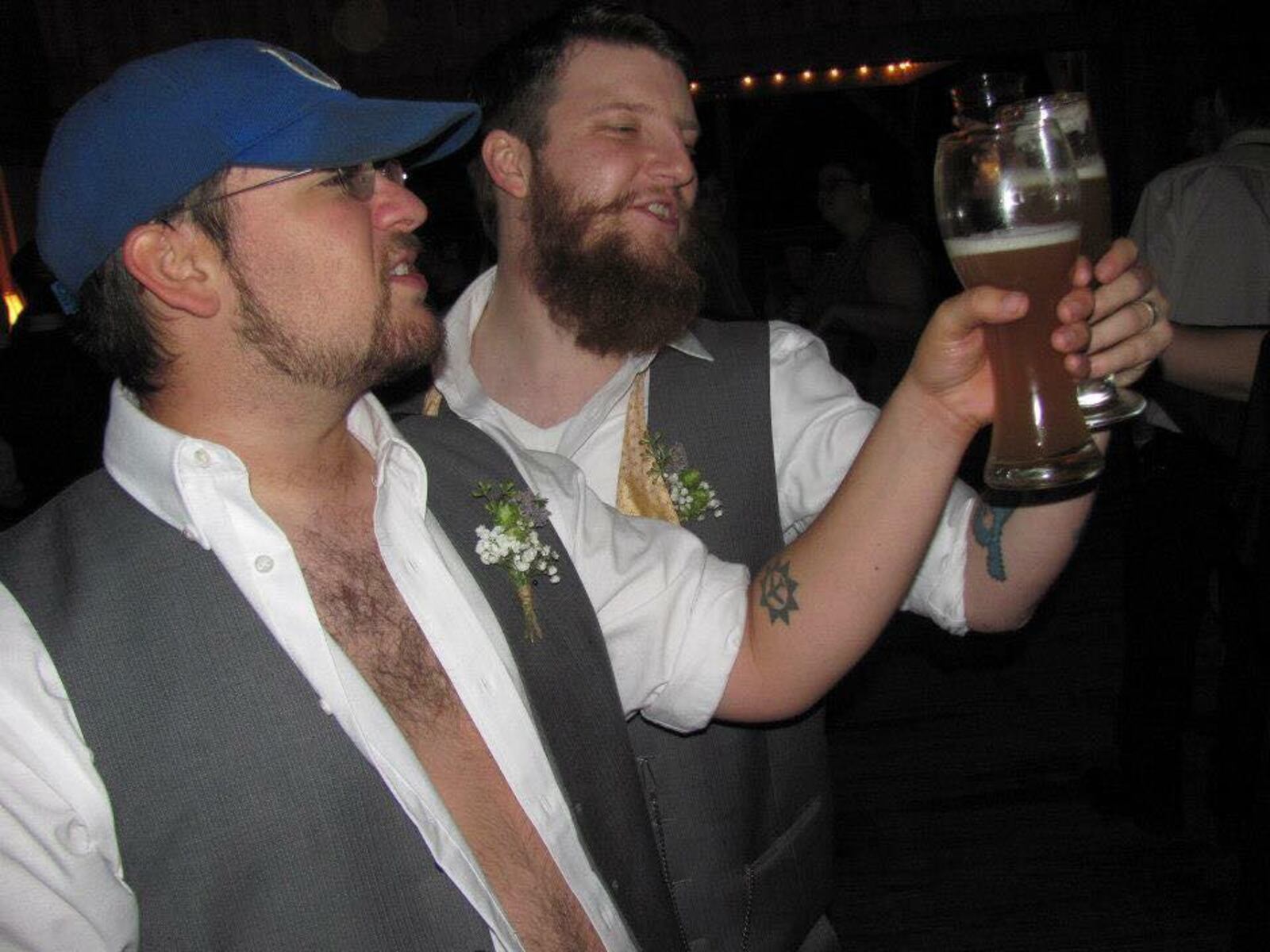 Chris Thompson (right) and Gus Stathes (left)  dreamed of eating Skyline Chili with White Castle sliders and made it happened.   The Dayton men toss during Thompson’s wedding. 