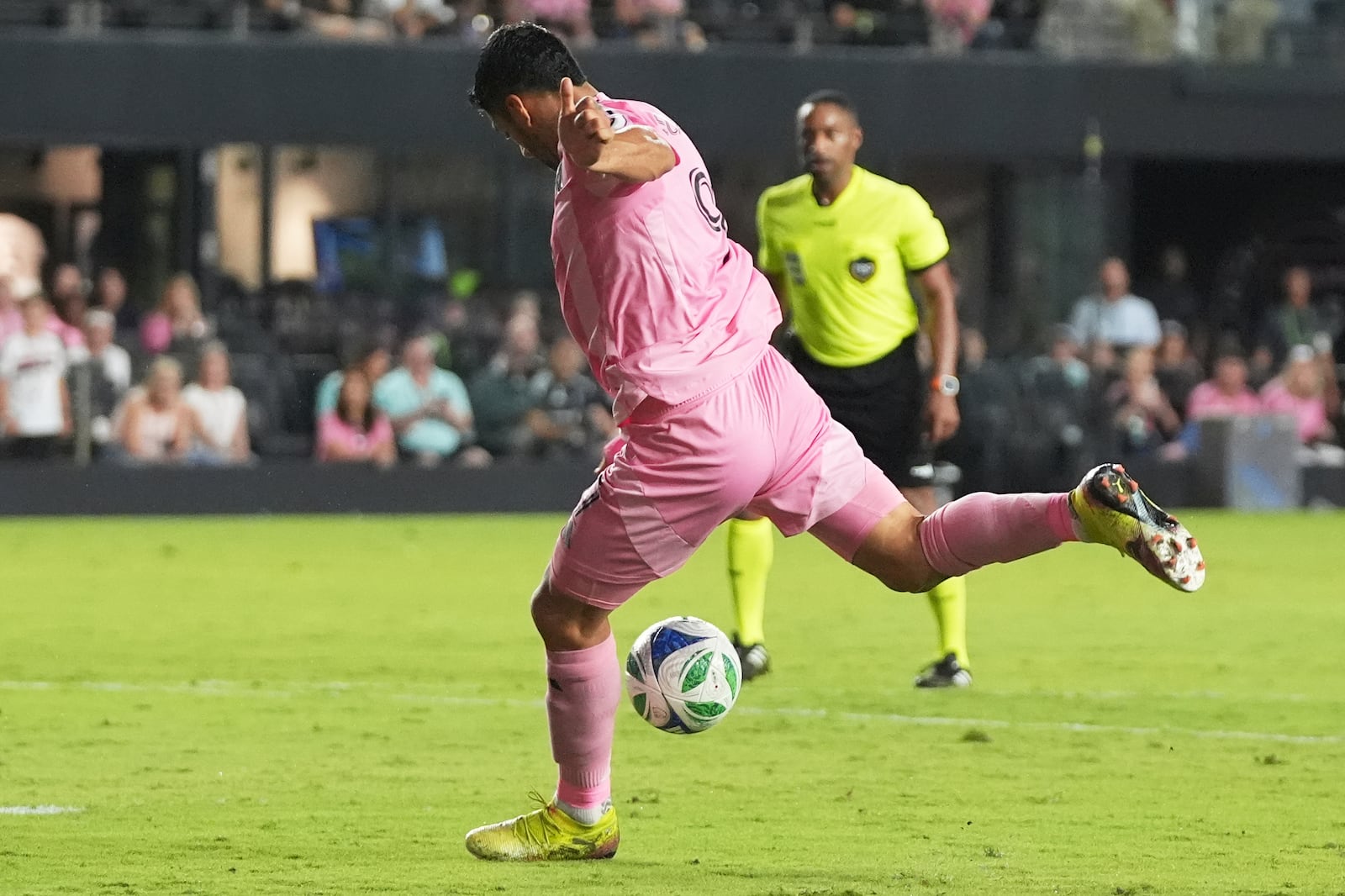 Inter Miami forward Luis Suárez kicks the ball to score a goal during the second half of an MLS soccer match against CF Montreal, Wednesday, May 28, 2025, in Fort Lauderdale, Fla. (AP Photo/Lynne Sladky)