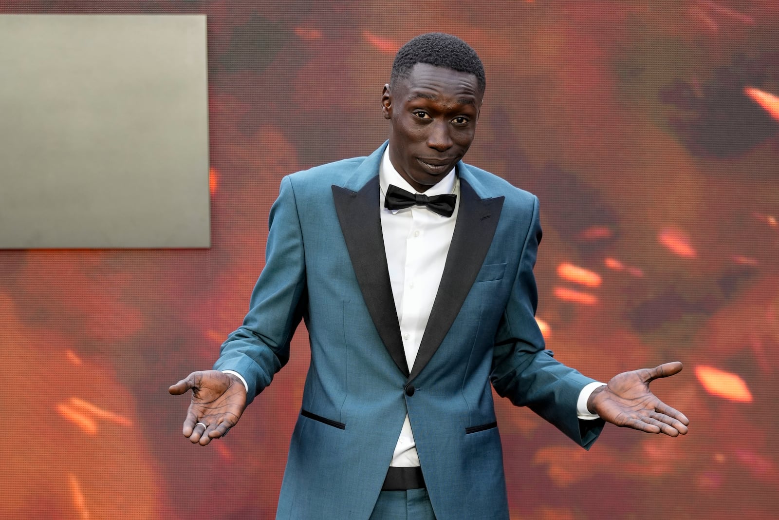 FILE - Khaby Lame poses for photographers upon arrival at the premiere of the film 'Oppenheimer' in London, July 13, 2023. (Scott Garfitt/Invision/AP File)