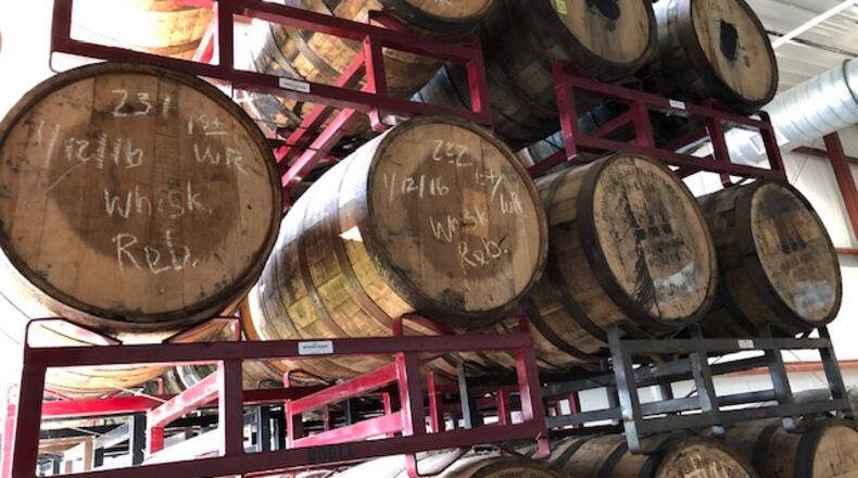 Barrel-aged beer at Warped Wing Barrel Room & Smokery in Springboro. MARK FISHER/STAFF
The 20,000-square-foot facility at the crossroads of Springboro at State Routes 73 and 741 will house a tap room, a restaurant, an outdoor biergarten-style patio, a large space for barrel-aging beers, a test-pilot brewery, a distribution hub and event space