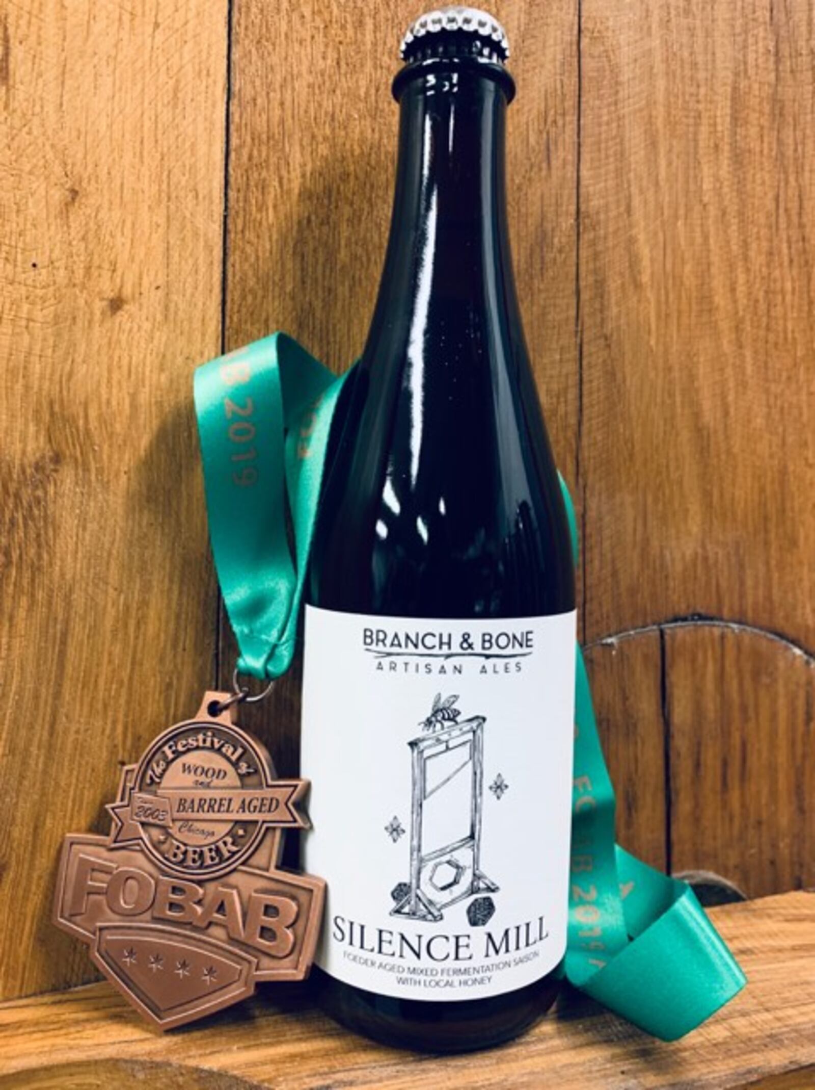 Dayton craft brewery Branch & Bone scores a bronze medal for its 'Silence Mill' at the Festival of Wood- and Barrel-Aged Beer held last weekend in Chicago.