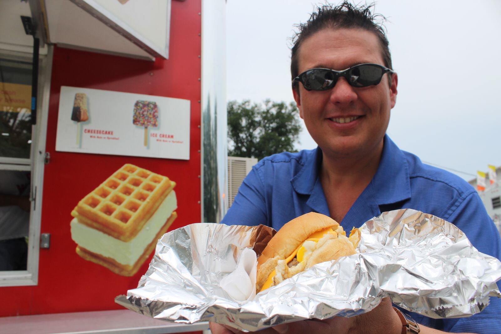 This gigantic breakfast sandwich will win you over. And K99.1FM's Frye Guy agrees. This breakfast sandwich has a large sausage patty with egg and cheese on a bun. Yum! Get it this week from the Shives stand at the Montgomery County Fair. AMELIA ROBINSON/STAFF