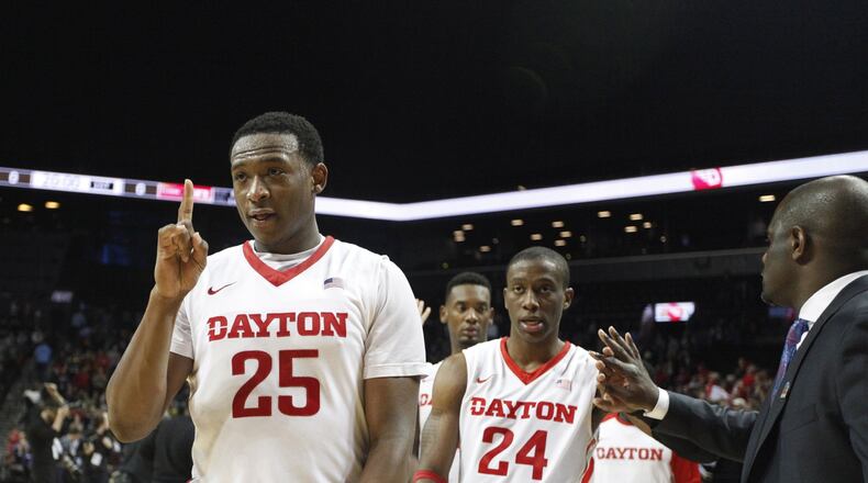 Dayton’s Kendall Pollard and Jordan Sibert leave the court after a victory against St. Bonaventure in the quarterfinals of the Atlantic 10 tournament on Friday, March 13, 2015, at the Barclays Center in Brooklyn, N.Y. David Jablonski/Staff