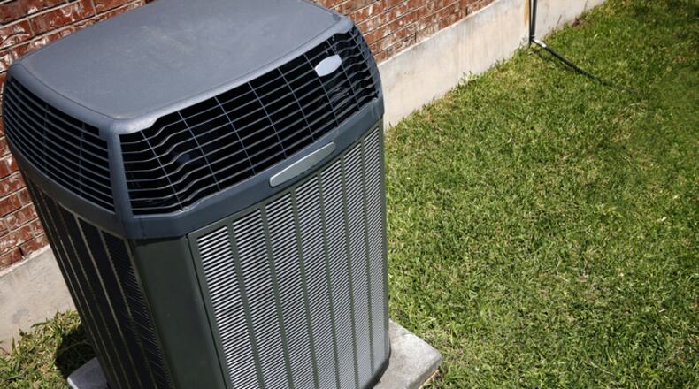 Do you know all the factors that go into the cost of a new air conditioner? (Image source: Fotosearch.com)