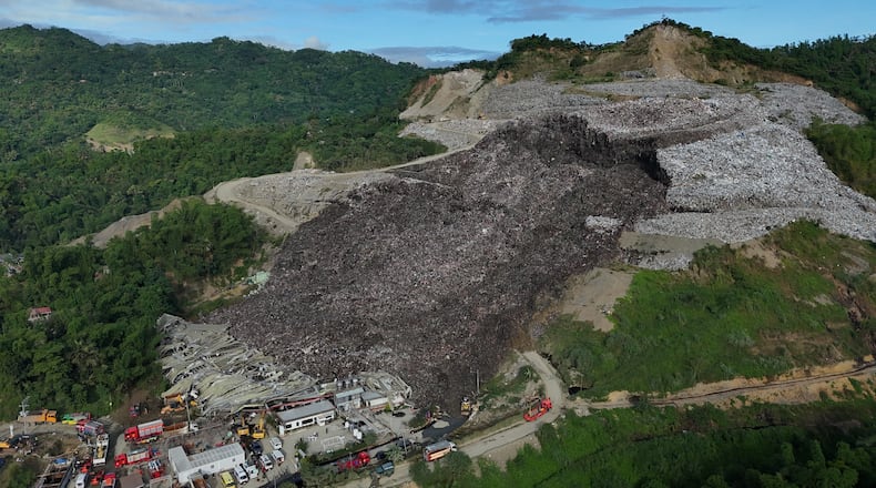 An aerial view of a huge mound of garbage that collapsed at a waste segregation facility in Binaliw, Cebu city on Friday, Jan. 9, 2026. (AP Photo/Jacqueline Hernandez)