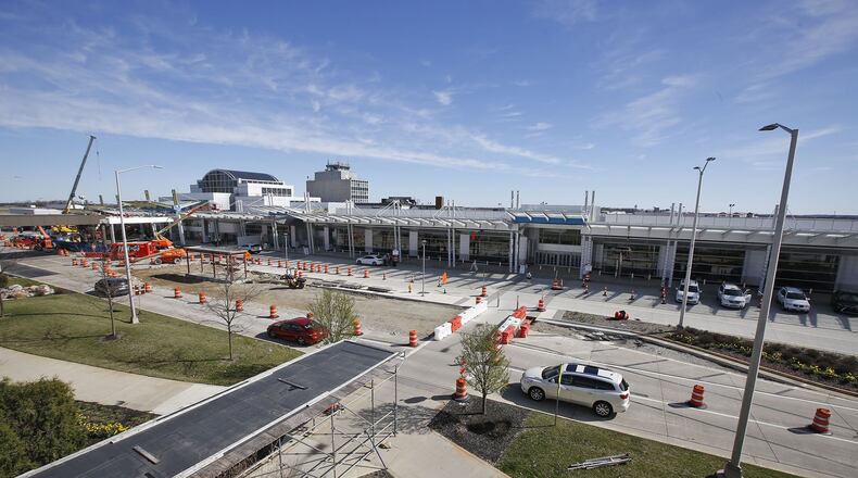 Renovation to the Dayton Airport terminal continues with new terrazzo floors and a full glass and steel exterior with a glass canopy to bring more natural light into the terminal. TY GREENLEES / STAFF