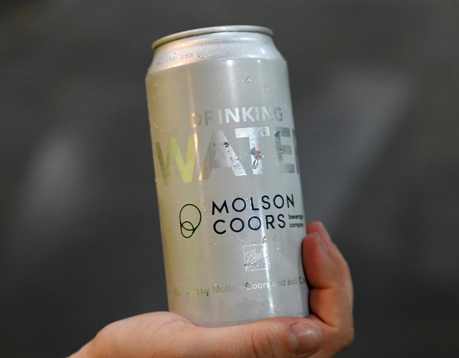Once a year, Molson Coors in Trenton produces canned water to distribute to disaster areas around the country. This year, the Trenton brewery has doubled its output to between 600,000 to 800,000 cans of water. It cans the water in a single day in April, but this year they delayed the run to storms and tornado activity in the area. Pictured is a container of water canned on May 12, 2025. MICHAEL D. PITMAN/STAFF
