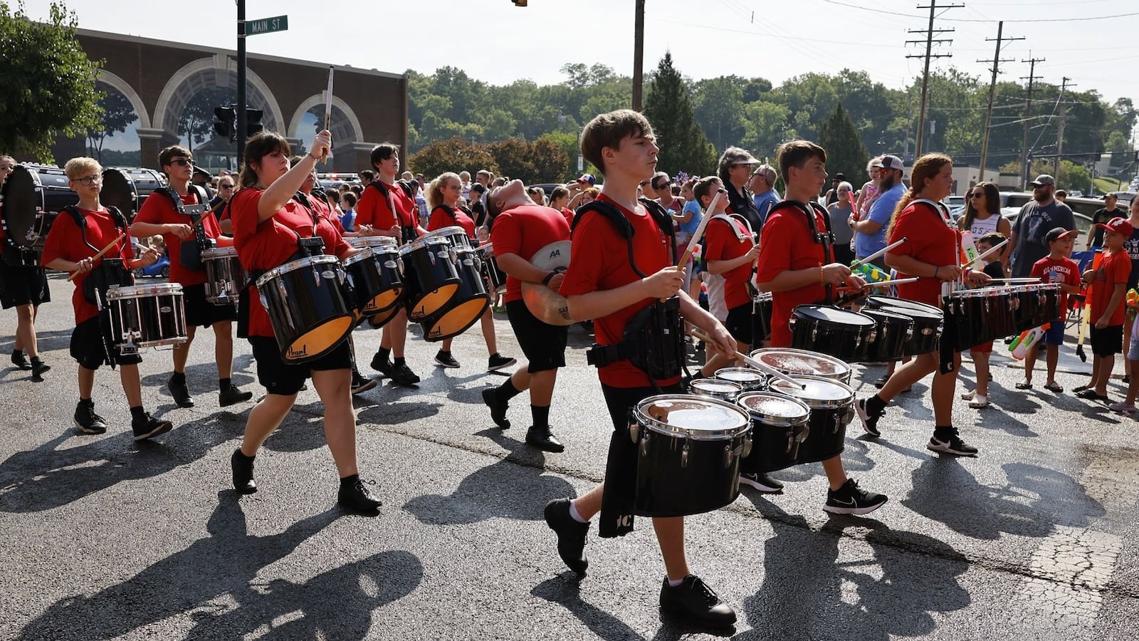 The Franklin High School marching band performs during Franklin's Independence Day Parade Tuesday, July 4, 2023, on Main Street in Franklin. Doctors are warning coaches and band leaders to watch for signs of heat illnesses in children this time of year. 
NICK GRAHAM/STAFF