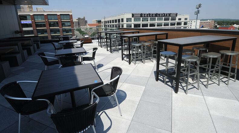 A look inside the new rooftop bar and restaurant, called The Foundry, at the AC Hotel Dayton by Marriott, that overlooks Day Air Ball Park from several stories above East First Street. MARSHALL GORBY\STAFF