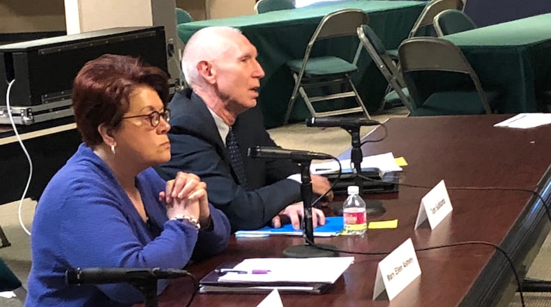 Wright State vice president for enrollment Mary Ellen Ashley and Provost Tom Sudkamp speak during a board of trustees meeting.