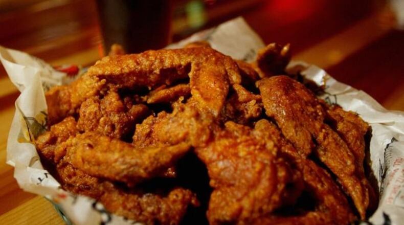 The Miami Twp. location of Roosters – targeted for today – has been put on until later this month, a company official said. FILE