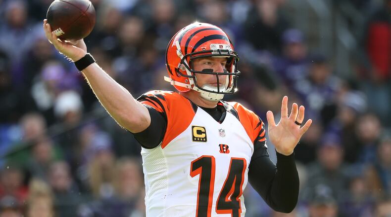 BALTIMORE, MD - NOVEMBER 27: Quarterback Andy Dalton #14 of the Cincinnati Bengals passes the ball against the Baltimore Ravens in the first quarter at M&T Bank Stadium on November 27, 2016 in Baltimore, Maryland. (Photo by Rob Carr/Getty Images)