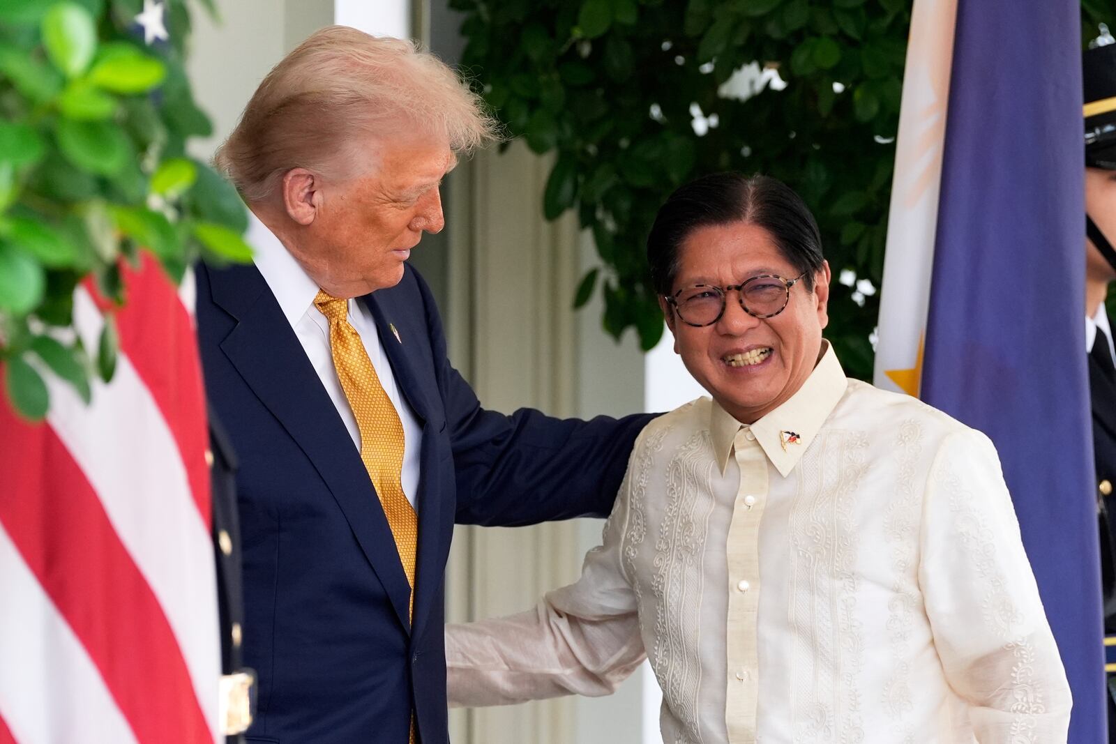 President Donald Trump greets Philippine President Ferdinand Marcos Jr., upon arrival at the White House, Tuesday, July 22, 2025, in Washington. (AP Photo/Alex Brandon)