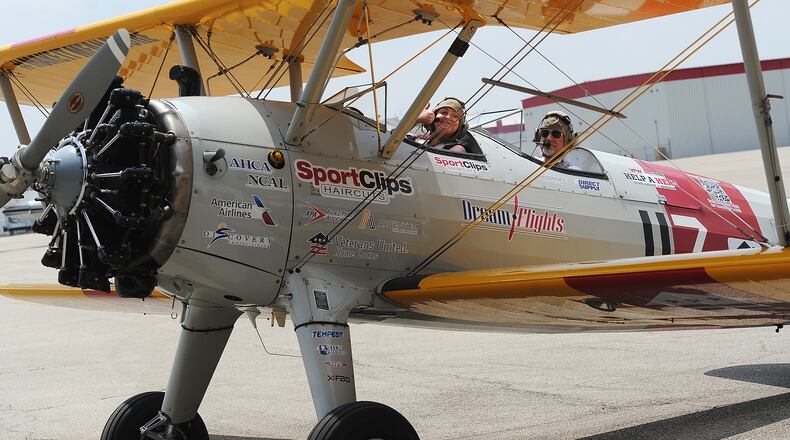 Dayton Daily News reporter Sydney Dawes flew with nonprofit Dream Flights on Wednesday at Dayton International Airport. Dream Flight offers seniors and veterans trips around the sky in a Stearman, which will be on display during the Dayton Air Show. Wednesday, July 19, 2023 was Dawes’ first-ever flight in an airplane. MARSHALLGORBY\STAFF
