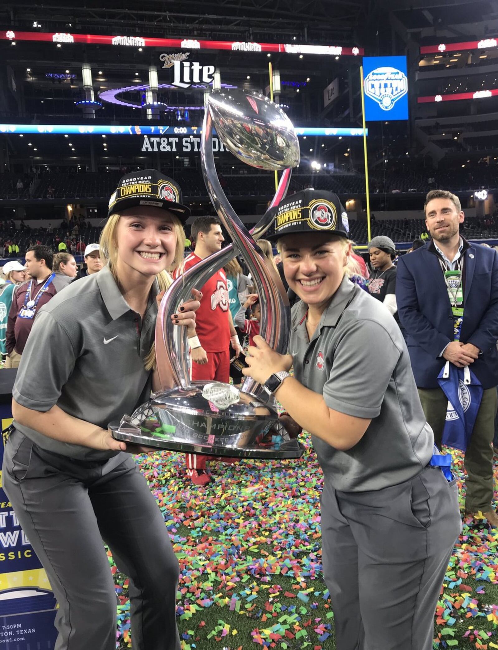 Ohio State athletic trainer Ali Fischer (right) with the Cotton Bowl trophy after the Buckeyes’ 24-7 win over USC in Arlington, Texas. CONTRIBUTED