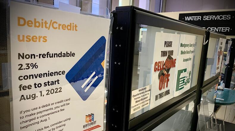 The Montgomery County Environmental Services will charge water and sewer customers a 2.3% convenience fee starting in August if they use a debit or credit card for payment. MARSHALL GORBY\STAFF