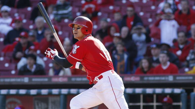 Cincinnati Reds' Shin-Soo Choo hits a ground rule double against Miami Marlins relief pitcher Steve Cishek during the 13th inning of a baseball game, Saturday, April 20, 2013, in Cincinnati. The Reds won 3-2. (AP Photo/David Kohl)