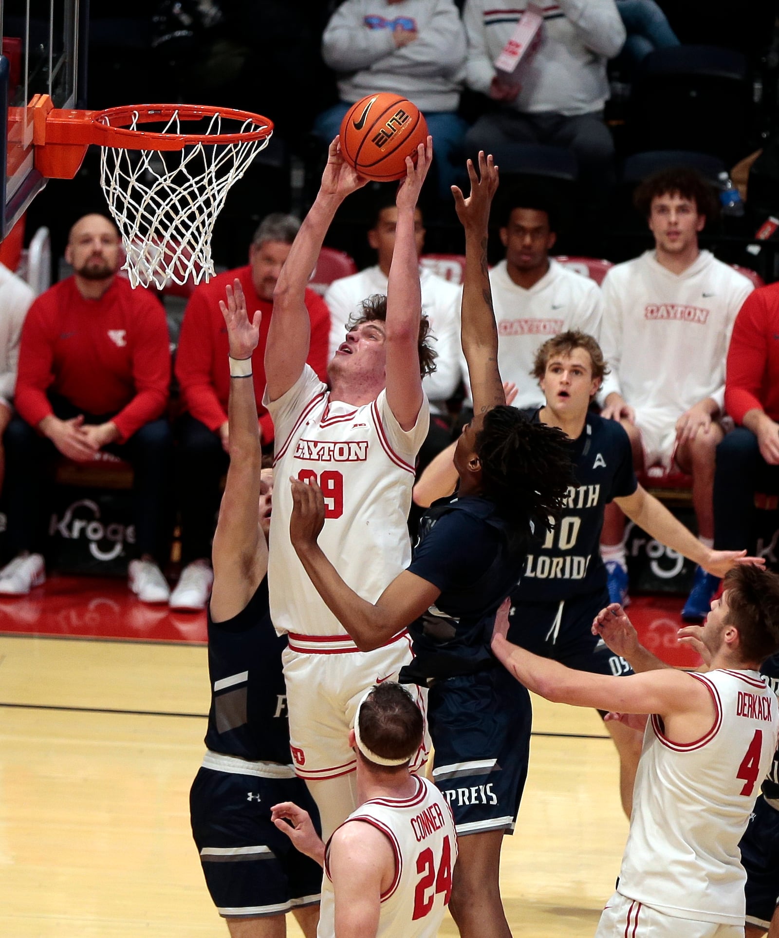 Dayton's Amael L'Etang leaps above several players to grab a rebound during a game against North Florida on Saturday, Dec. 13, 2025, at UD Arena. STEVEN WRIGHT / STAFF