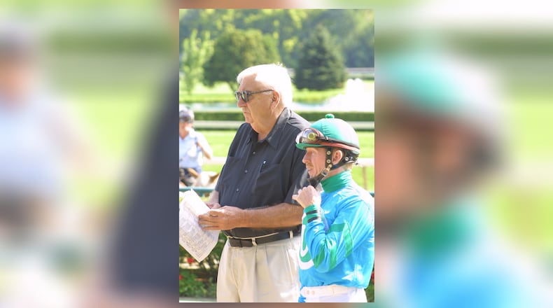 Jim Morgan (left) with longtime jockey Perry Ouzts. CONTRIBUTED