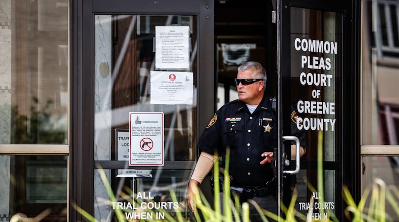 Greene County Deputy Albert Smith leaves the courthouse Thursday June 24, 2021. The Greene County Municipal Court canceled its Thursday docket. Jim Noelker/Staff